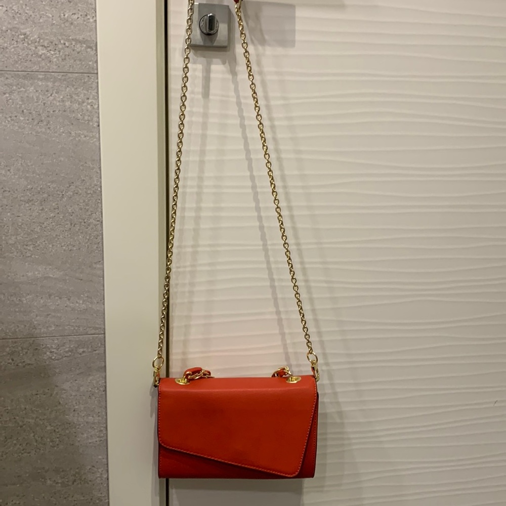 BCBG Generation red crossbody bag with gold chain
